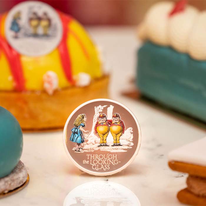 The Royal Mint celebrates launch of Through the Looking-Glass coin with a tasty tribute